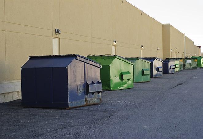 metal waste containers sit at a busy construction site in Algonquin IL